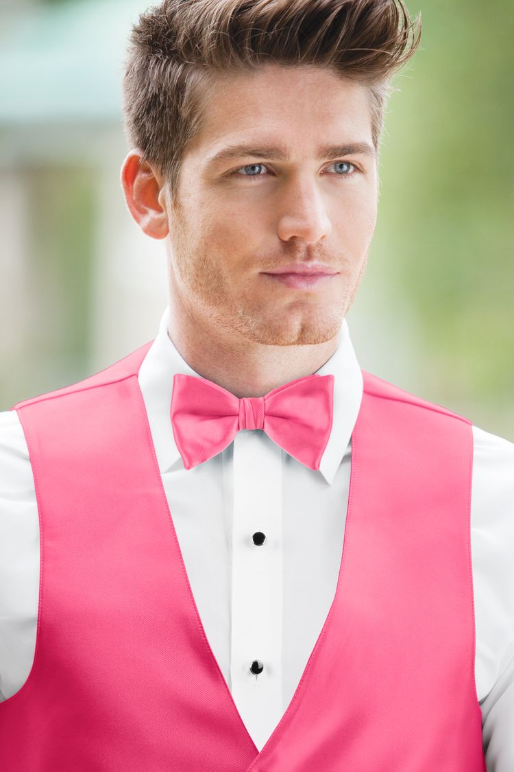 Guy wearing the Expressions Brite Pink Bow Tie and matching vest