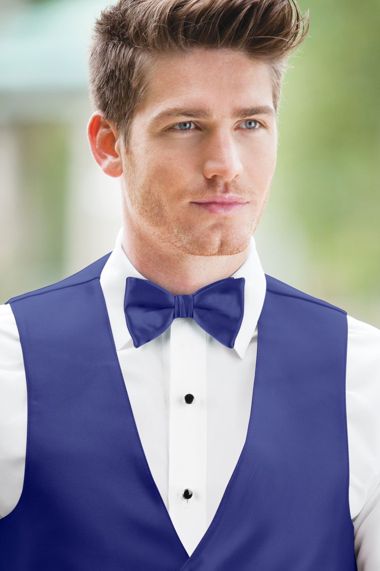 Guy wearing the Expressions Cobalt Bow Tie and matching vest