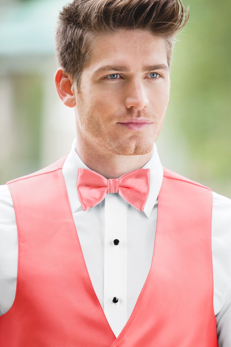 Guy wearing the Expressions Dark Coral Bow Tie and matching vest
