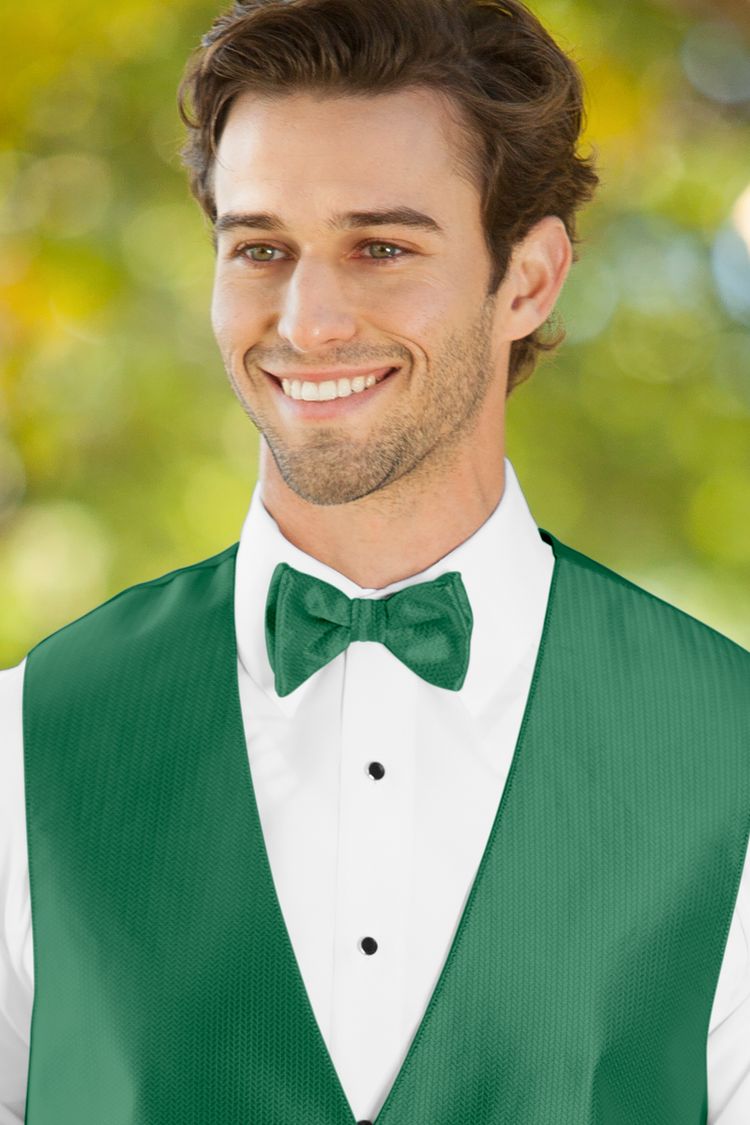 Man wearing the Herringbone Emerald Green Bow Tie with a matching vest