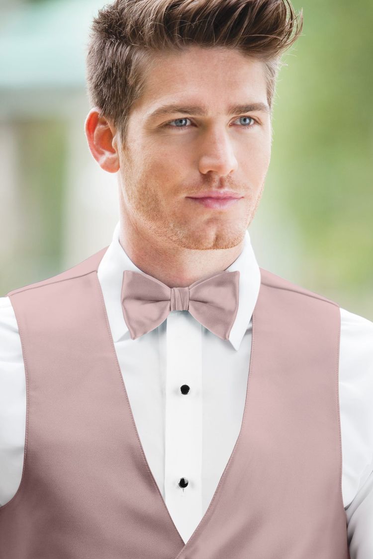 Guy wearing the Expressions First Blush Bow Tie with matching vest
