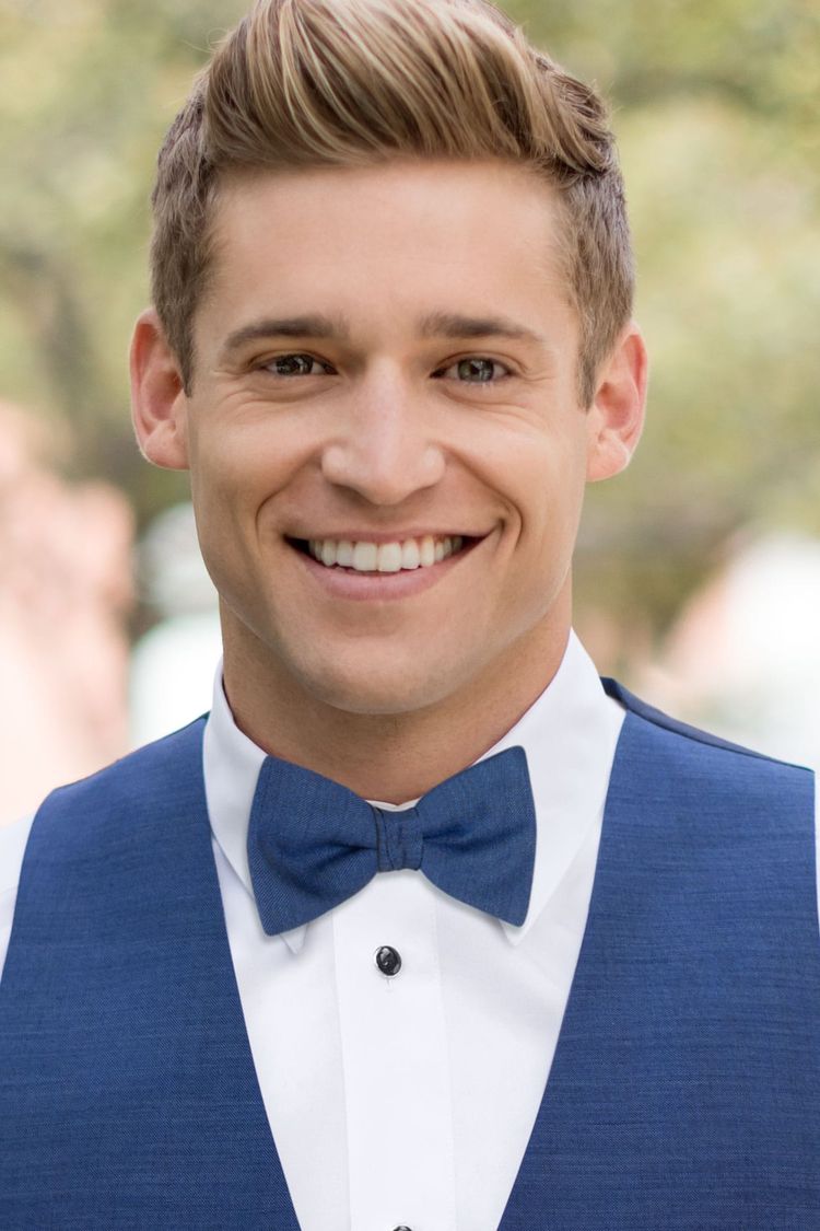 Guy wearing a Bow Tie Indigo Blue and a matching vest