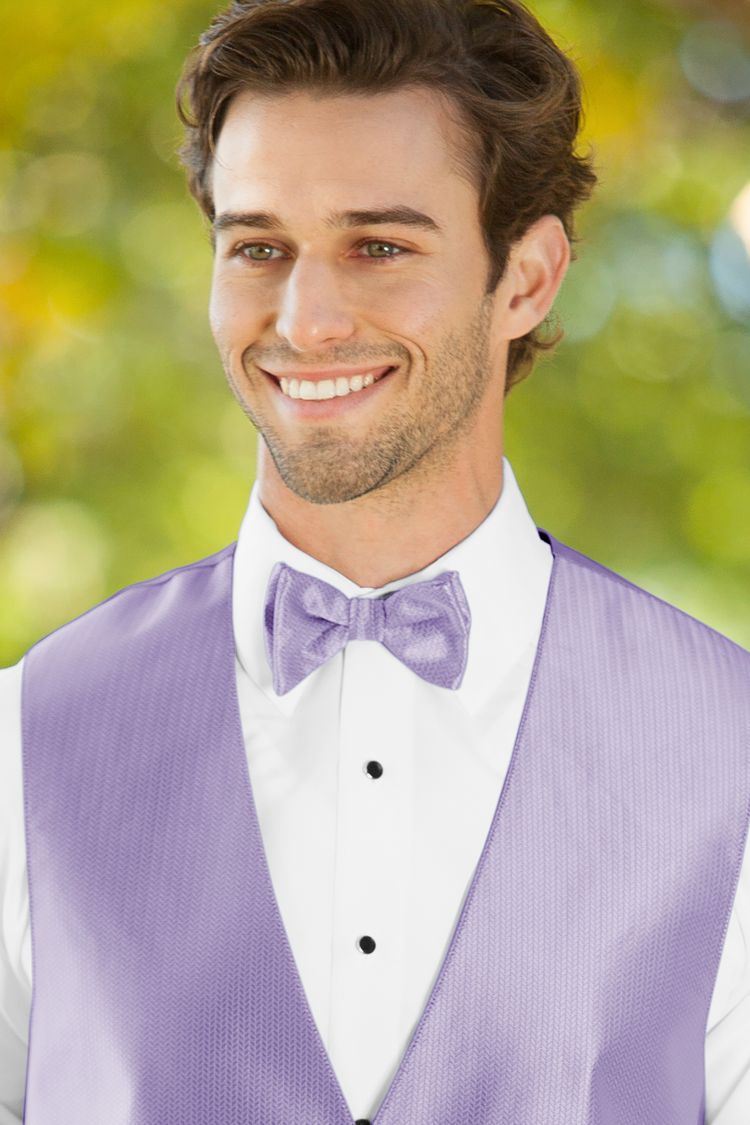 Man wearing the Herringbone Lavender Bow Tie with a matching vest