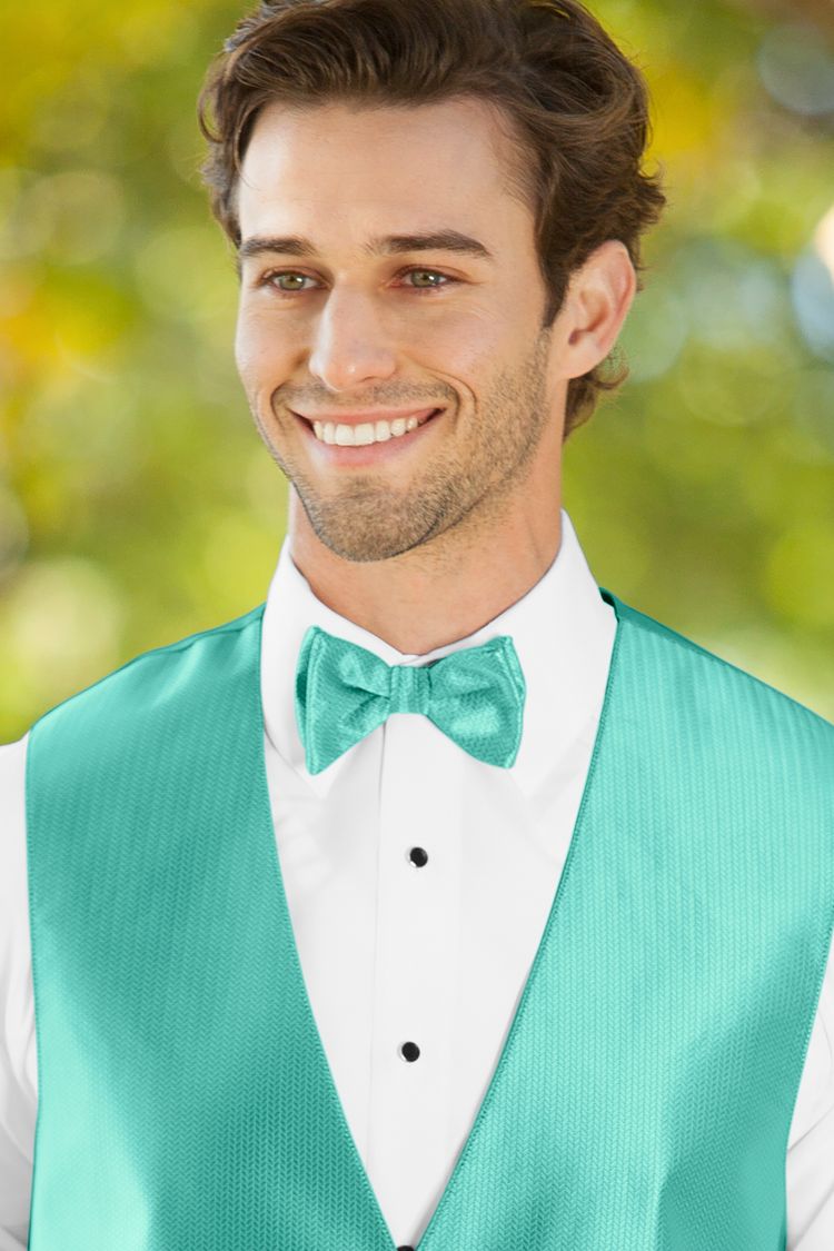 Man wearing the Herringbone Mermaid Bow Tie with a matching vest
