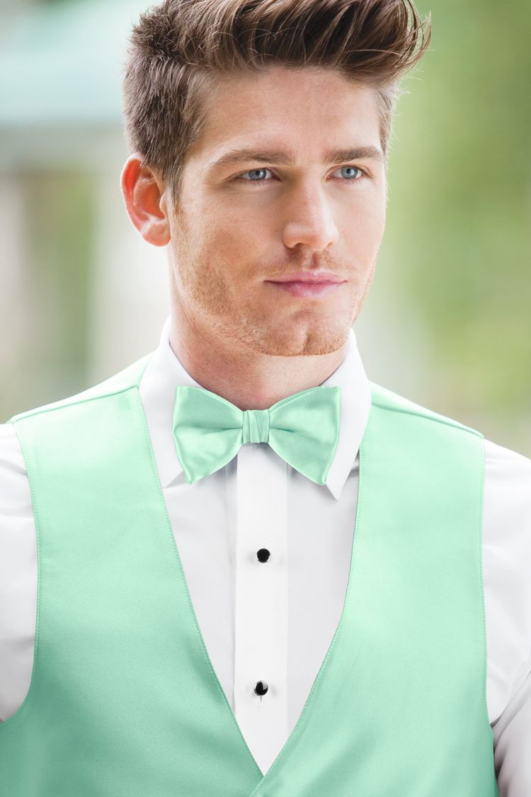 Man wearing the Expressions Mint Bow Tie with a matching vest