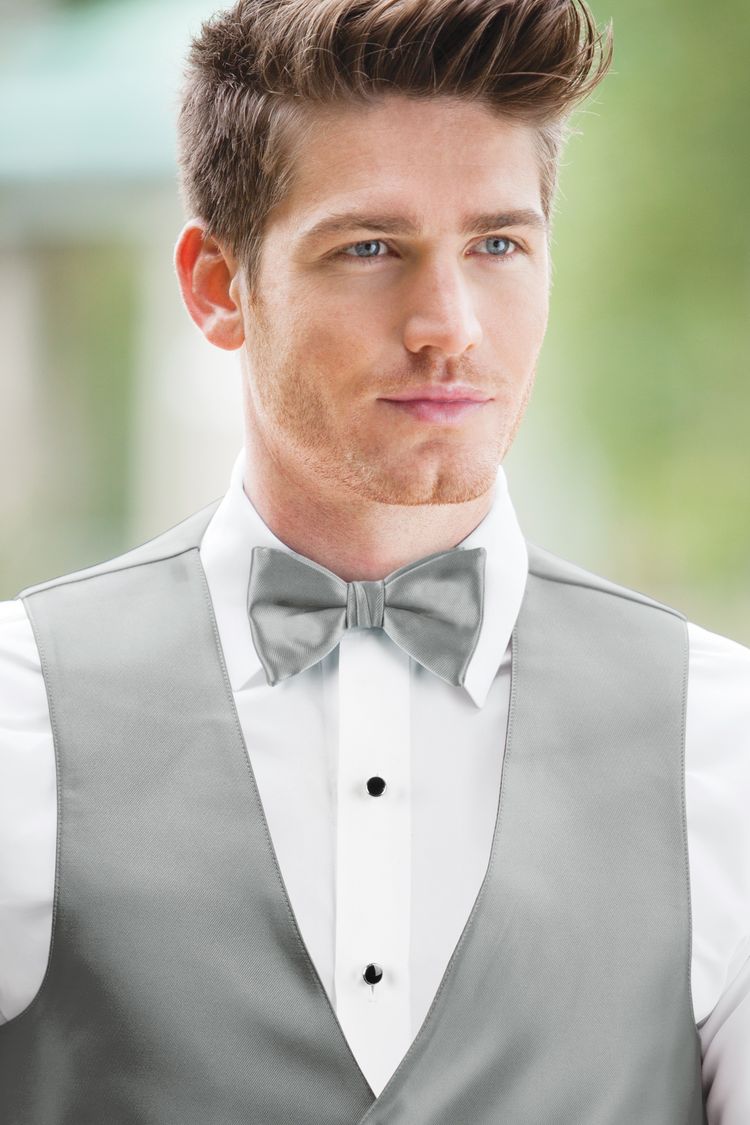 Man wearing the Expressions Platinum Bow Tie with a matching vest