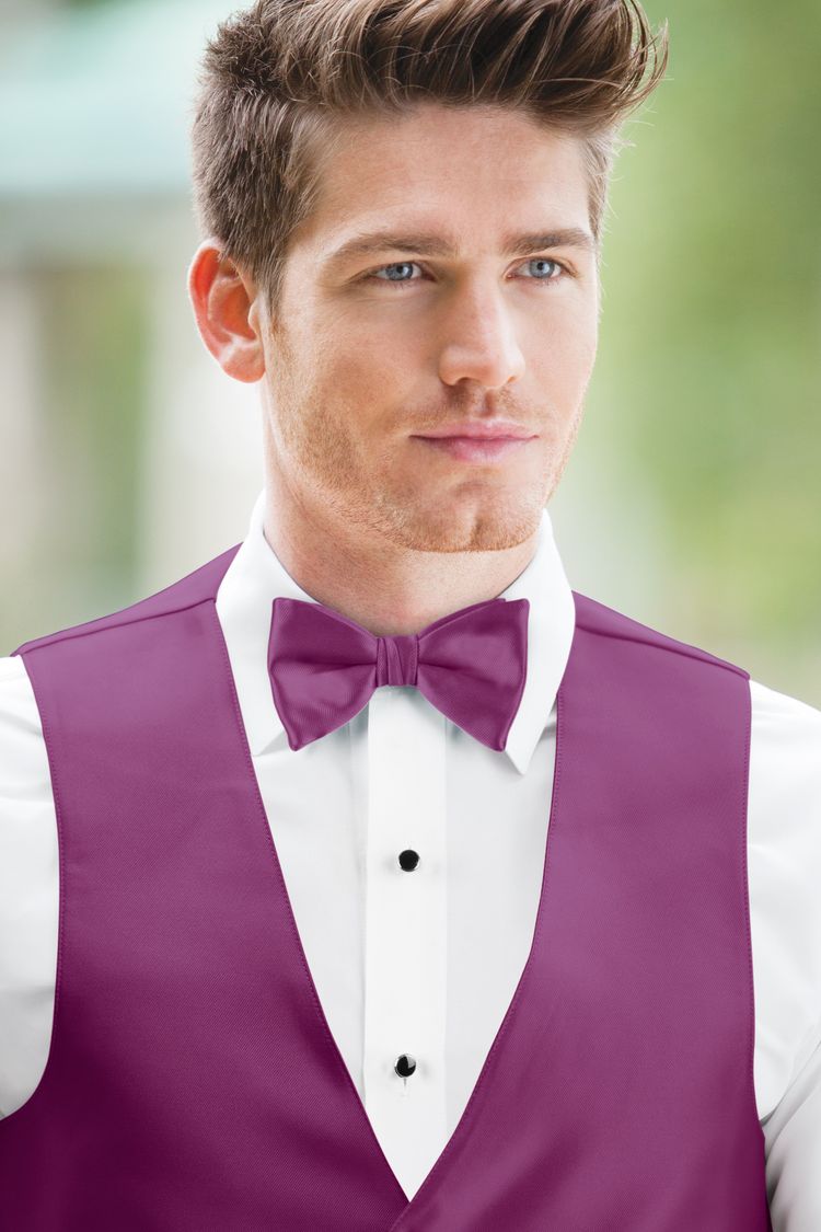 Man wearing the Expressions Raspberry Bow Tie with a matching vest