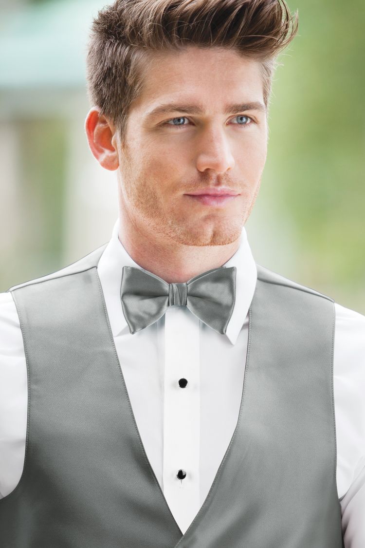 Man wearing the Expressions Silver Bow Tie with a matching vest
