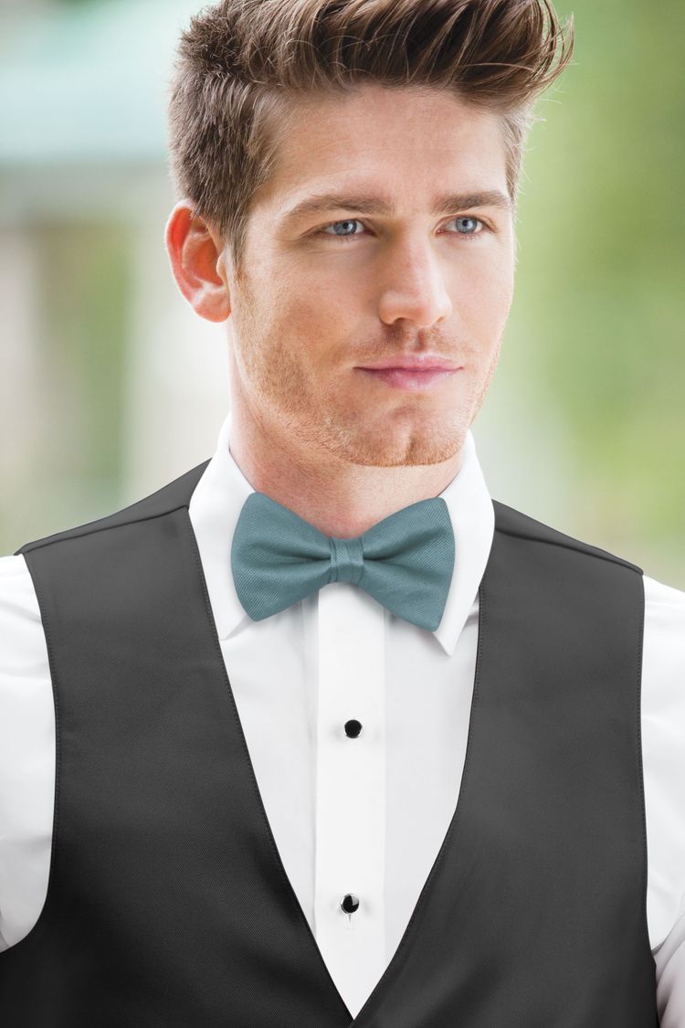Teal Blue Solid Bow Tie with a black vest