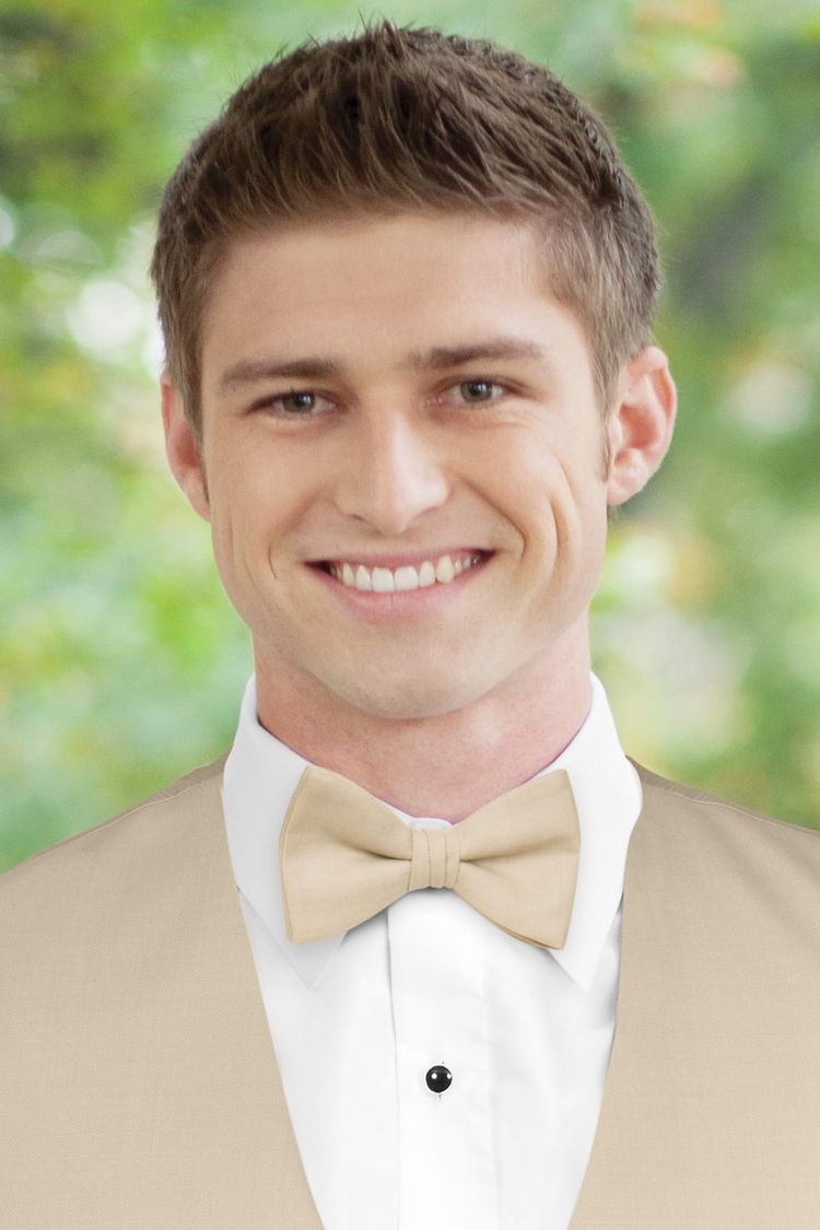 Man wearing a Bow Tie Tan with a matching vest