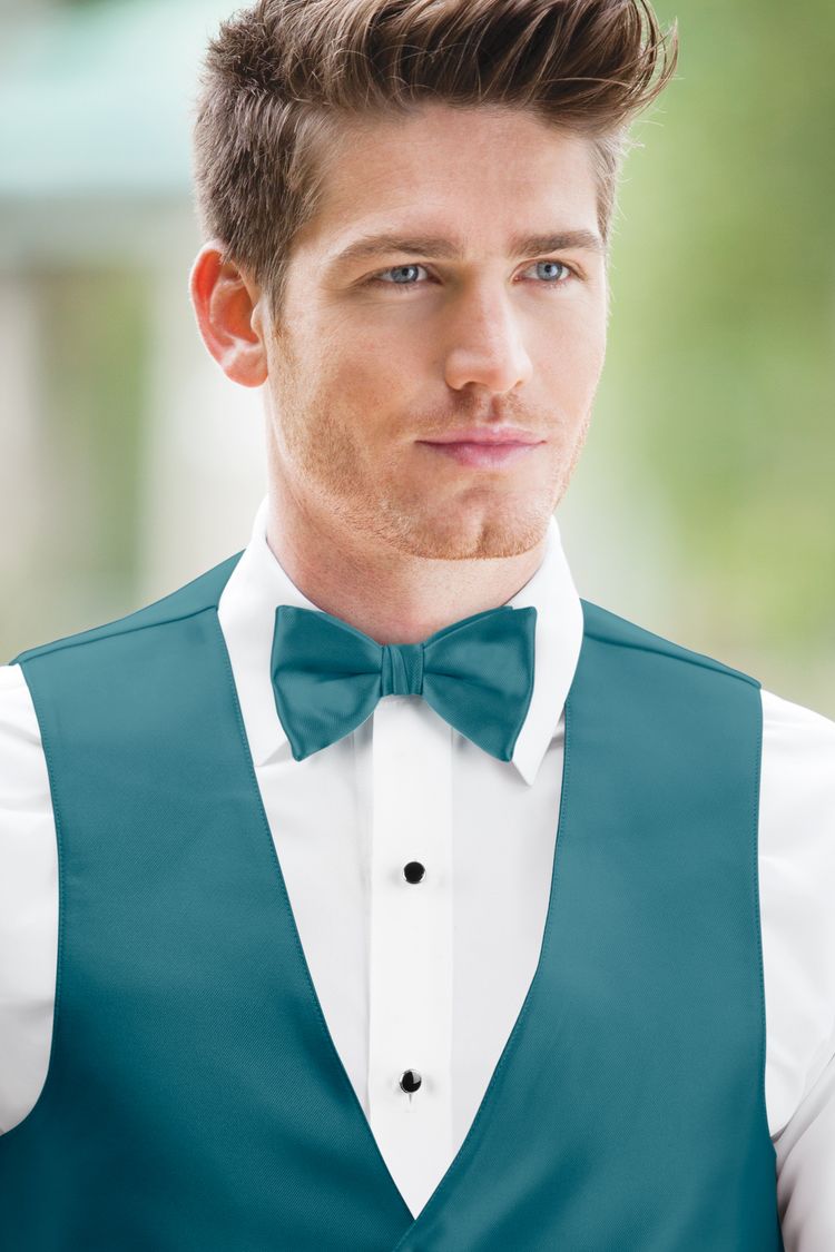 Man wearing the Expressions Teal Bow Tie with a matching vest
