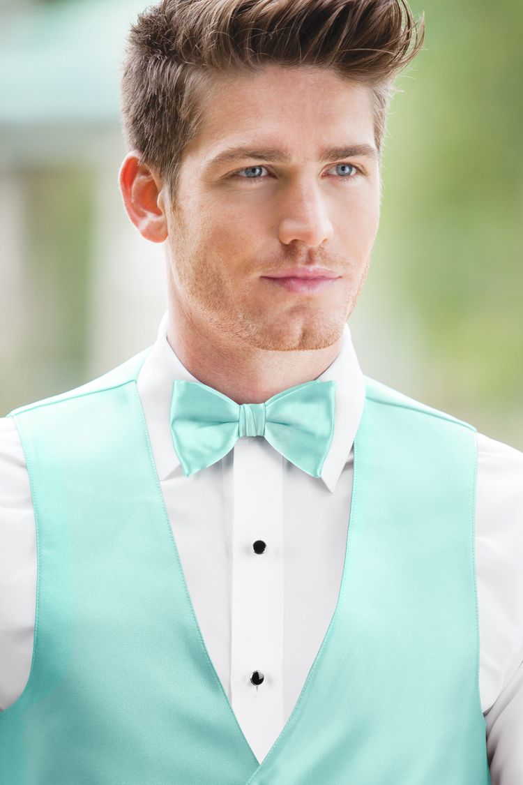 Man wearing the Expressions Tiffany Blue Bow Tie with a matching vest