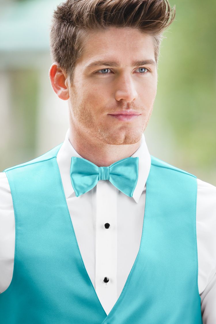 Man wearing the Expressions Turquoise Bow Tie with a matching vest