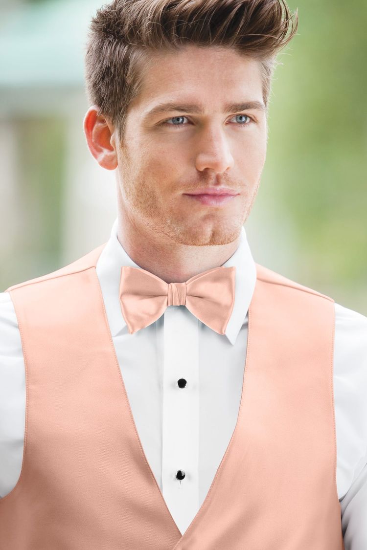 Man wearing a Expressions Bellini Bow Tie with a matching vest