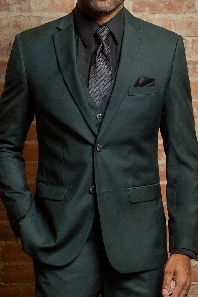 man wearing Couture 1910 Dark Green Vest with black shirt and black striped tie