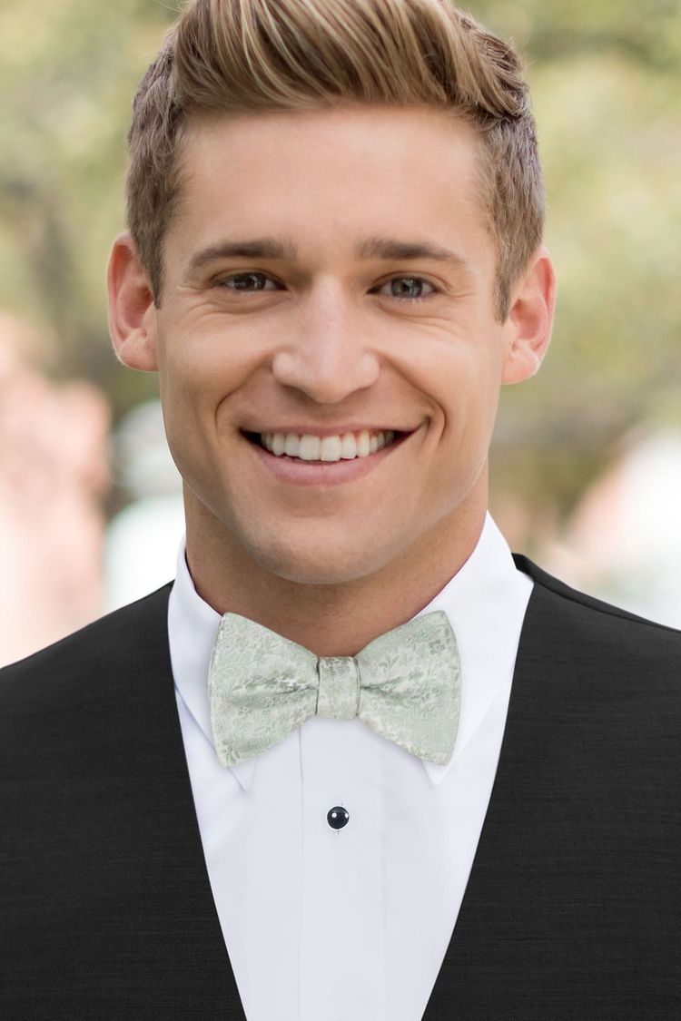 Man wearing Floral Sage Bow Tie with a black vest