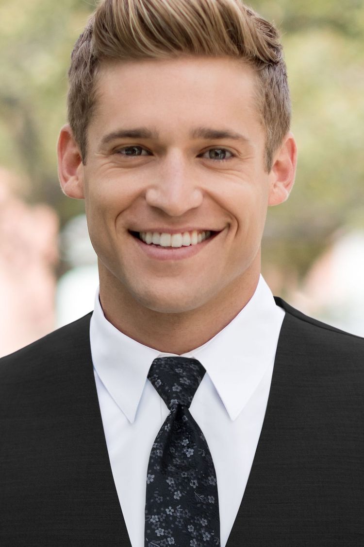 Man wearing a Floral Black Windsor Tie with a black vest