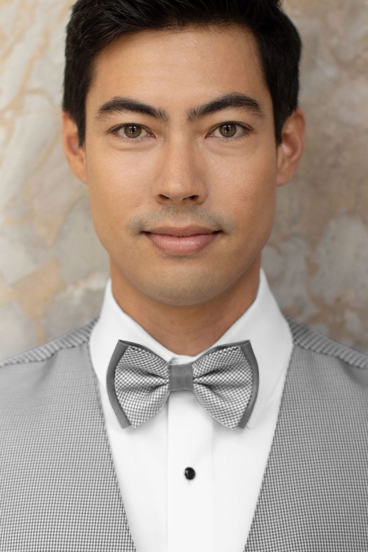 Man wearing a Foundation Heather Grey Bow Tie with a matching vest
