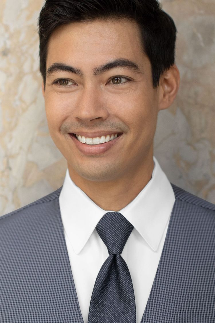 Man wearing a Foundation Woven Navy Windsor Tie with a matching vest