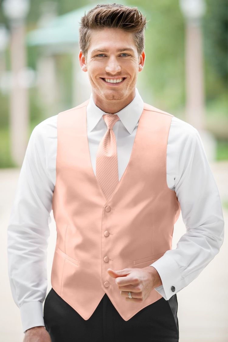 Guy wearing the Expressions Bellini Fullback Vest with a matching tie