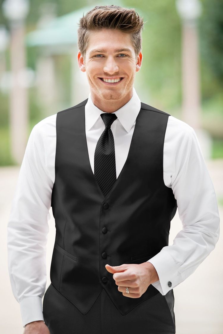 Guy wearing the Expressions Black Fullback Vest and matching tie