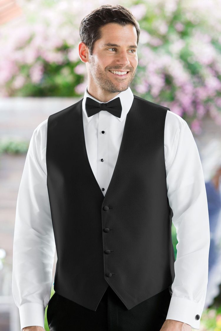 Man wearing the Herringbone Black Fullback Vest with a matching tie