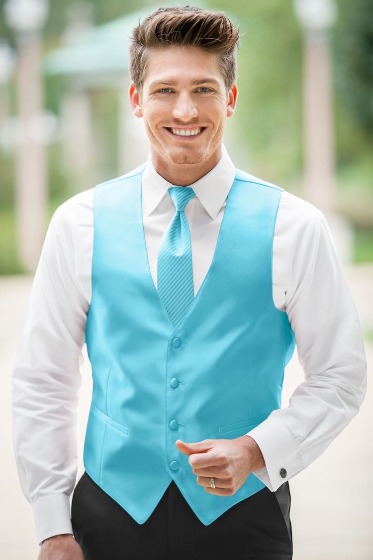 Guy wearing the Expressions Blue Box Fullback Vest and matching tie