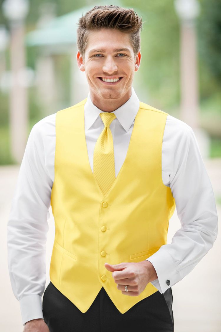 Guy wearing the Expressions Buttercup Fullback Vest and matching tie