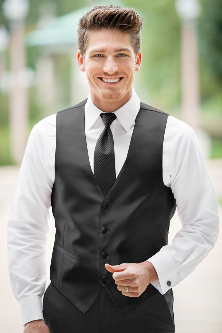 Guy wearing the Expressions Charcoal Fullback Vest and matching tie