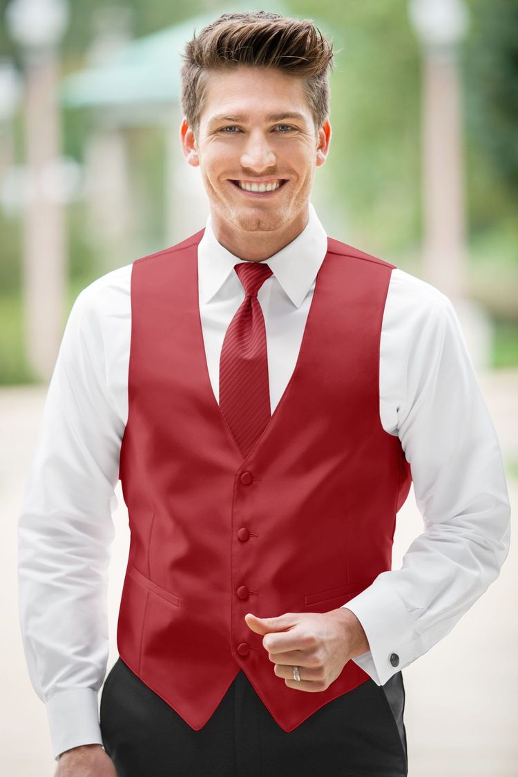Guy wearing the Expressions Cherry Fullback Vest and matching tie