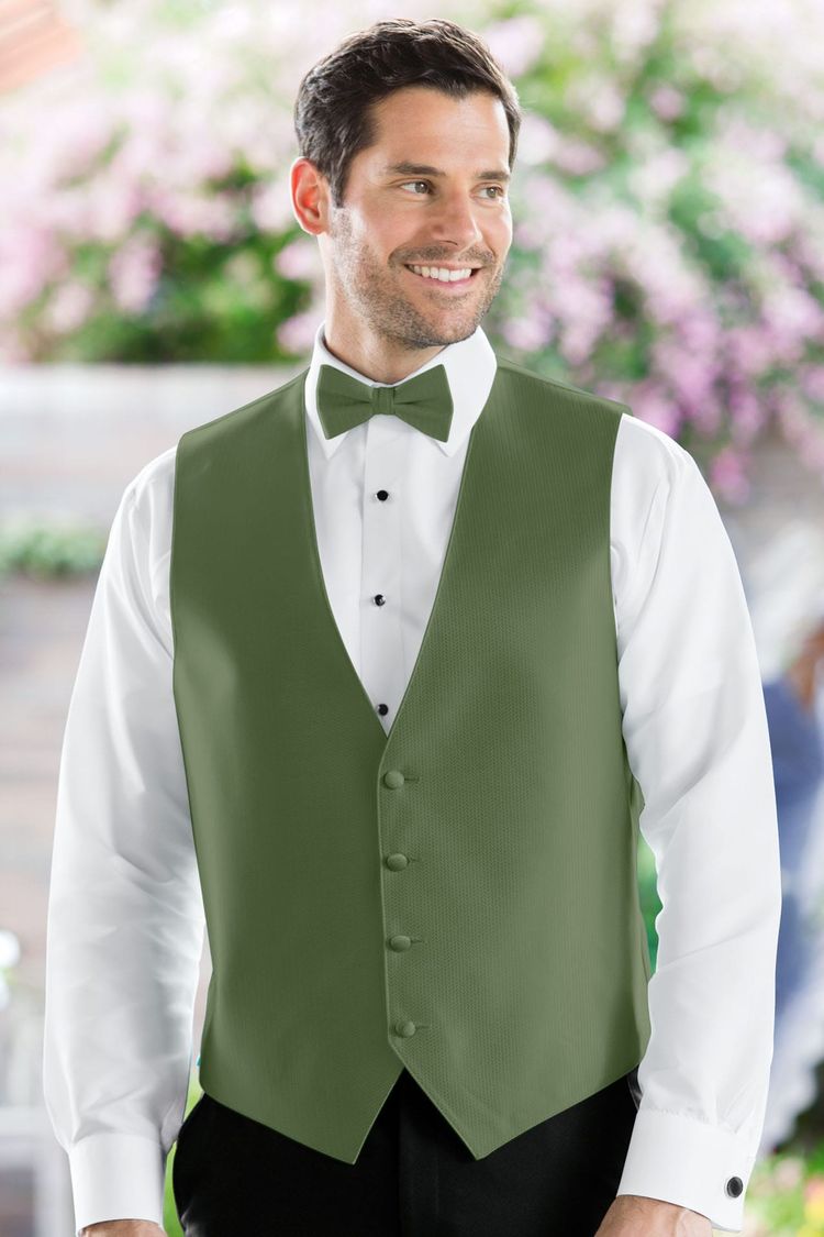 Man wearing the Herringbone Clover Fullback Vest with a matching tie