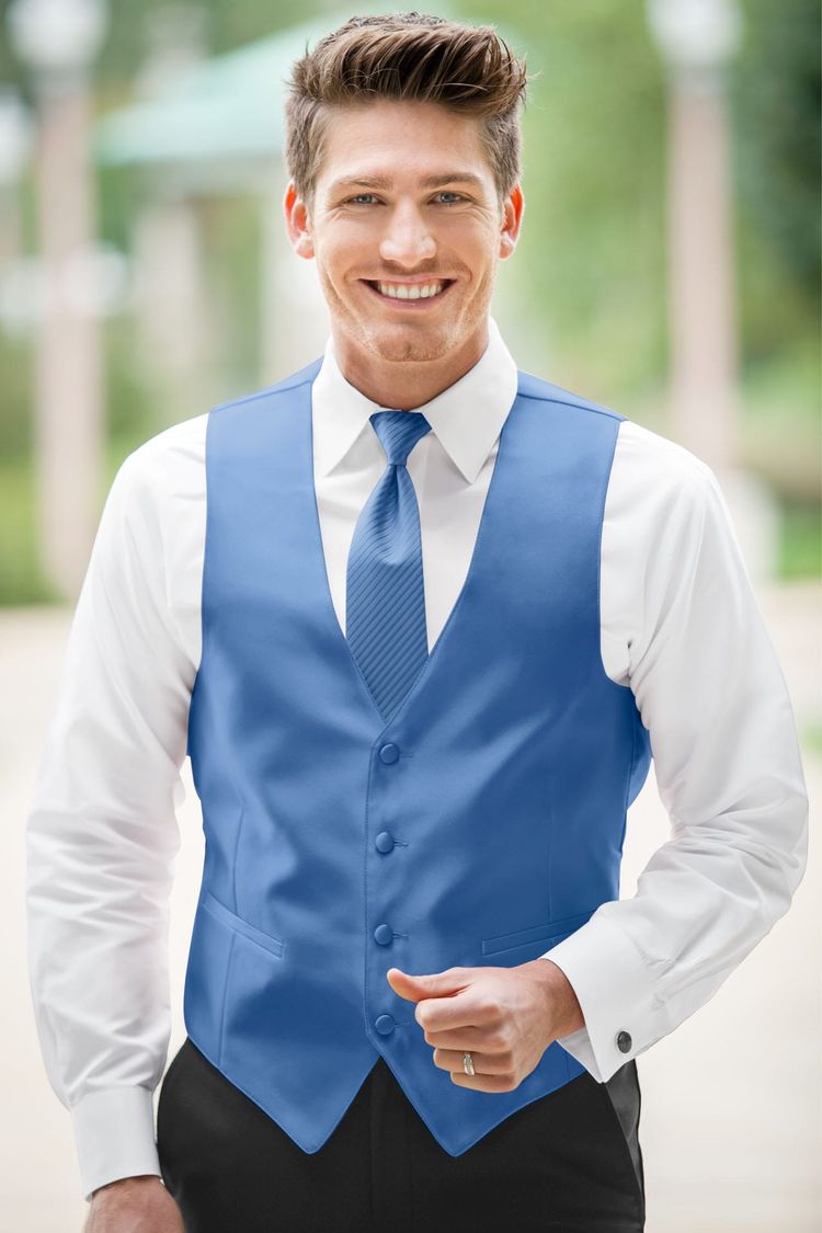 Guy wearing the Expressions Cornflower Fullback Vest and matching tie