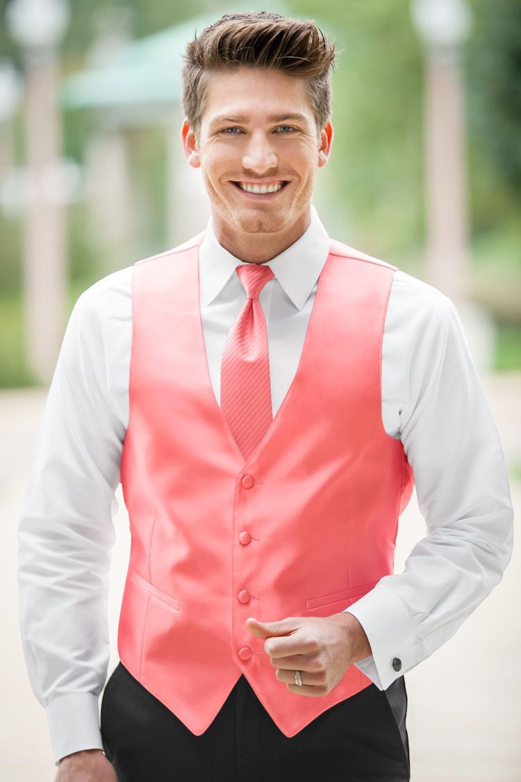 Guy wearing the Expressions Dark Coral Fullback Vest and matching tie