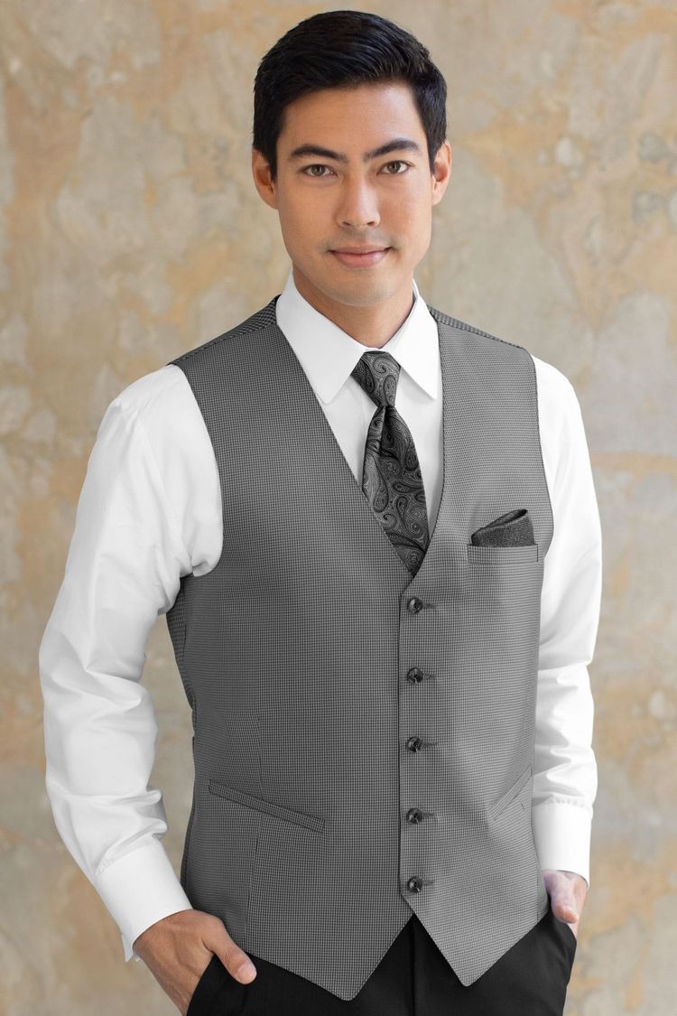 Guy wearing a Foundation Steel Grey Fullback Vest and a matching tie