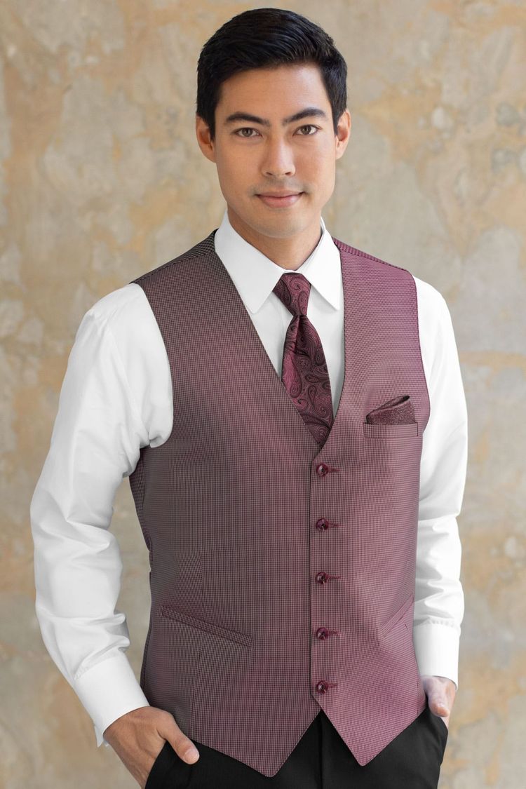 Guy wearing a Foundation Wine Fullback Vest and a matching tie