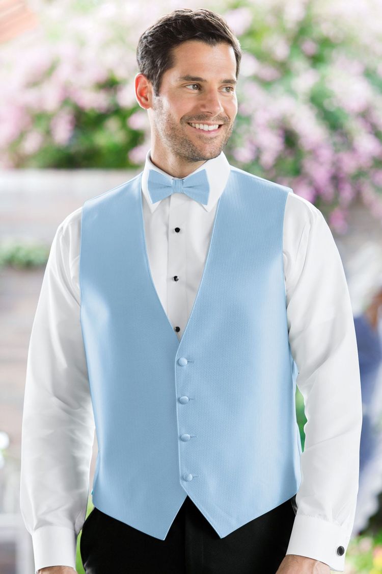 Man wearing the Herringbone Lite Blue Fullback Vest with a matching tie