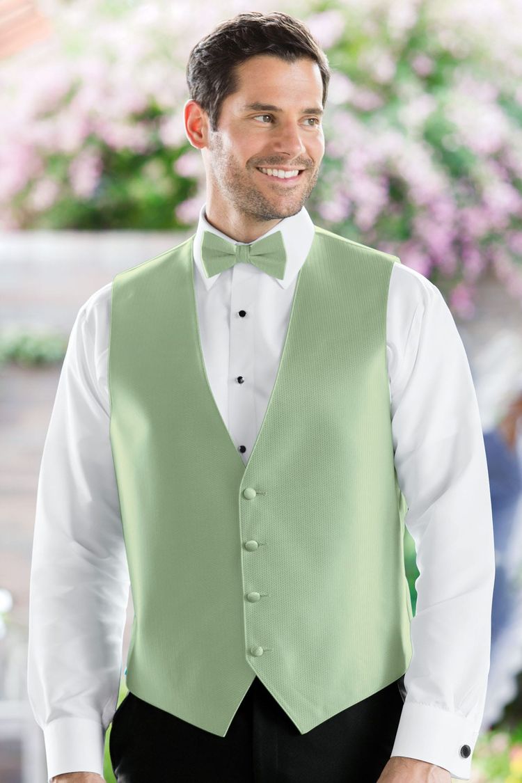Man wearing the Herringbone Meadow Fullback Vest with a matching tie