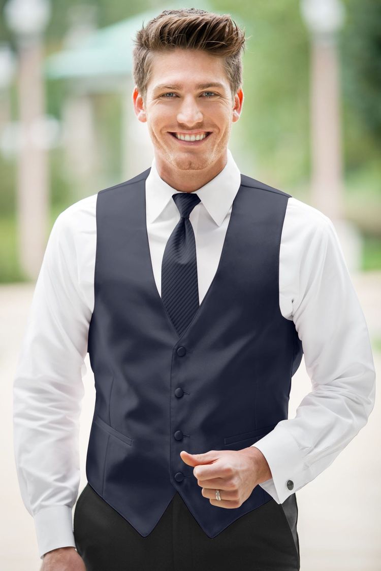 Guy wearing the Expressions Navy Fullback Vest with matching tie