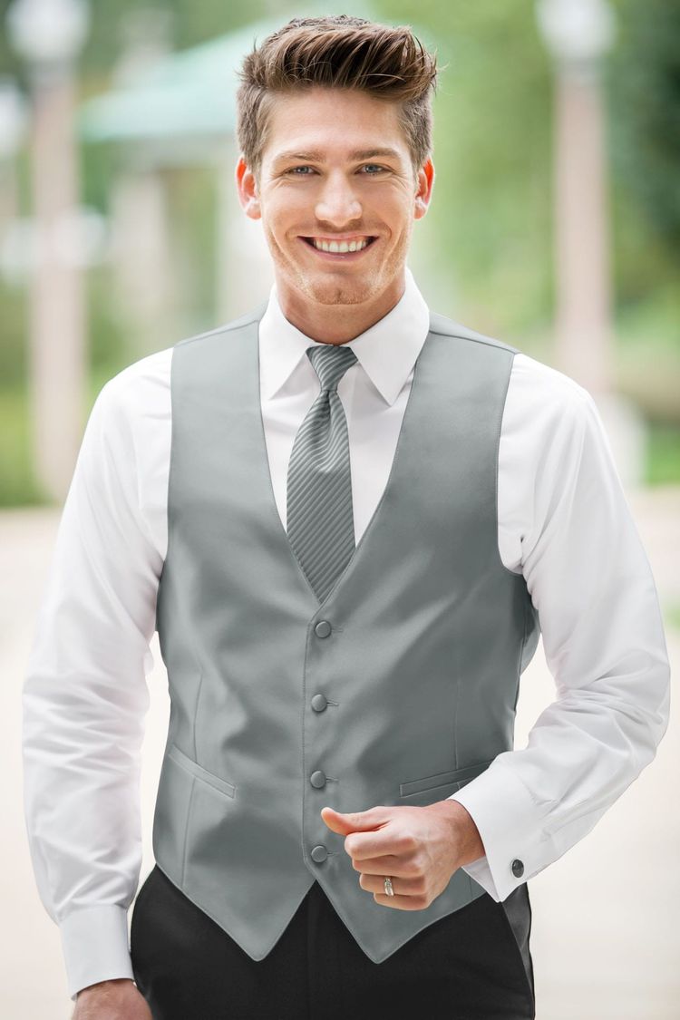 Guy wearing the Expressions Platinum Fullback Vest and matching tie