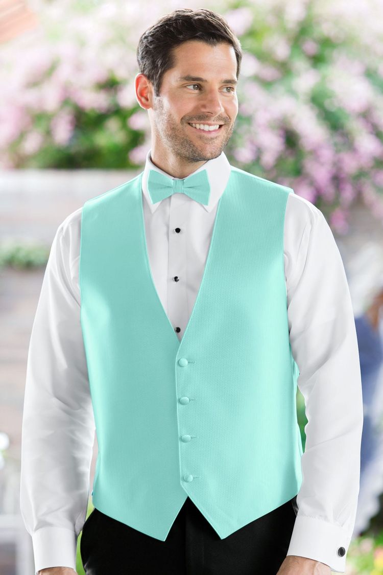 Man wearing the Herringbone Pool Fullback Vest with a matching tie