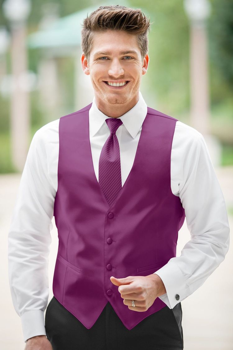 Guy wearing the Expressions Raspberry Fullback Vest and matching tie