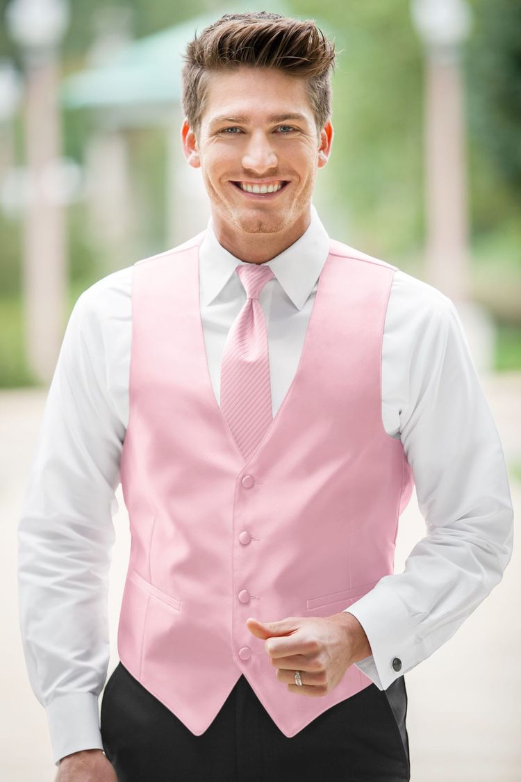 Guy wearing the Expressions Rose Petal Fullback Vest and matching tie