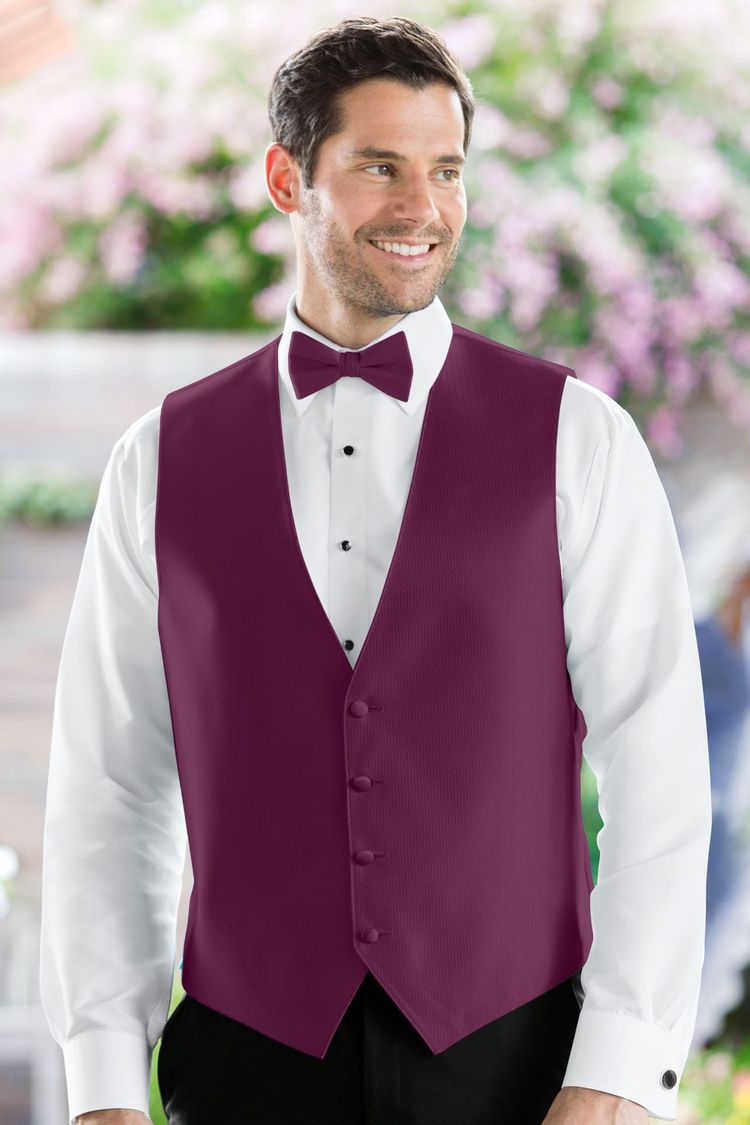 Man wearing the Herringbone Sangria Fullback Vest with a matching tie