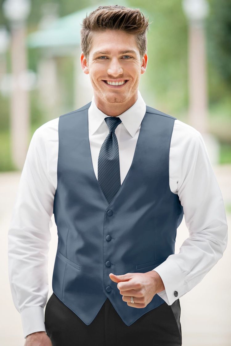 Guy wearing the Expressions Slate Blue Fullback Vest and a matching tie