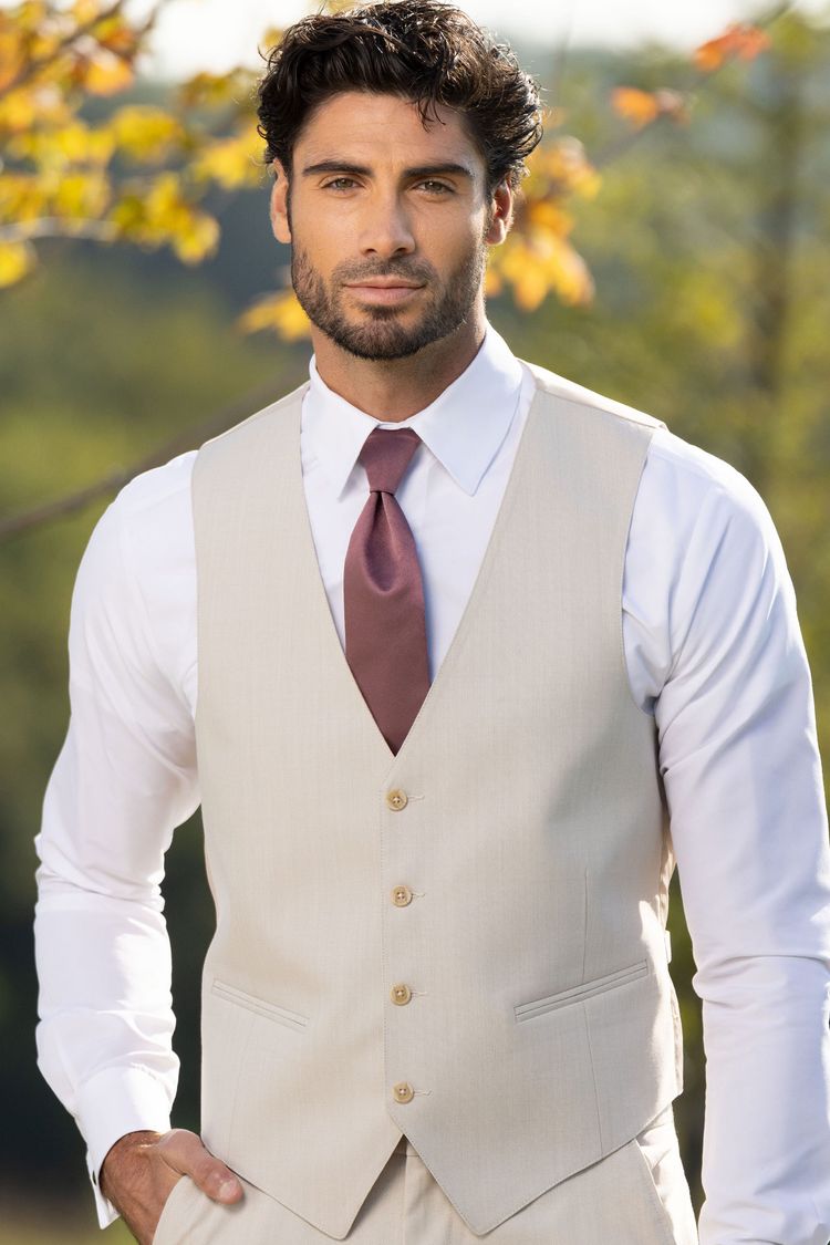 man wearing Michael Kors Tan Performance vest with cinnamon colored windsor tie