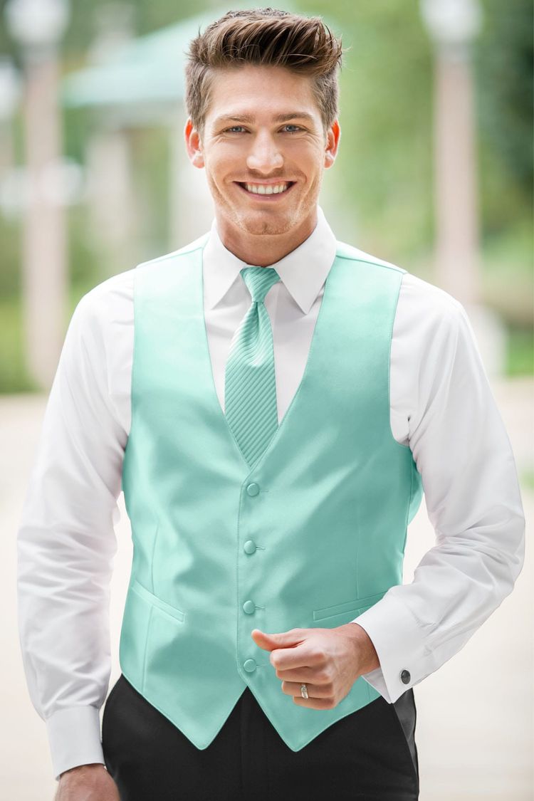 Guy wearing the Expressions Tiffany Blue Fullback Vest and matching tie