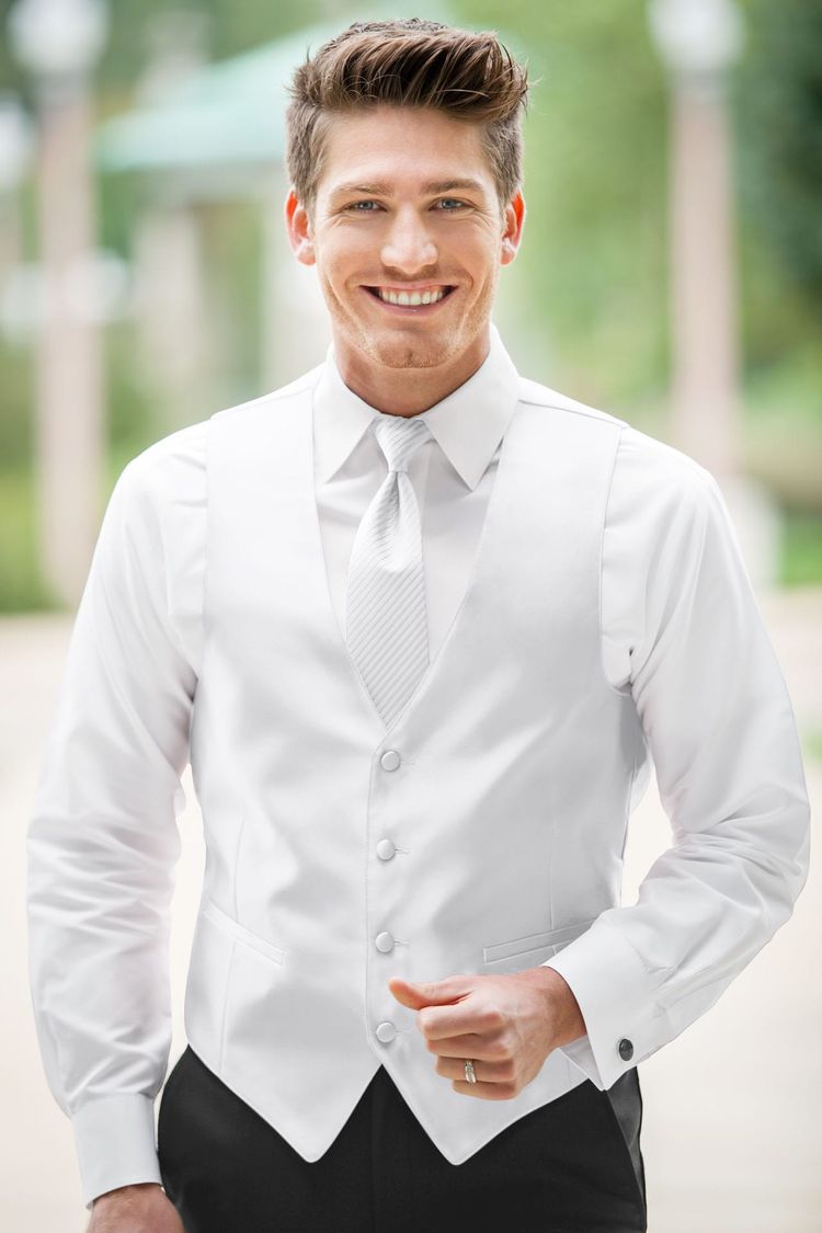 Guy wearing the Expressions White Fullback Vest with matching tie