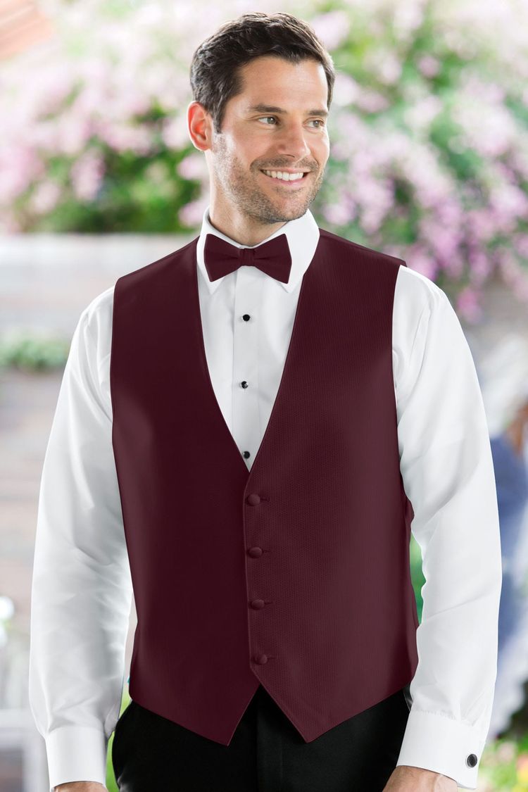 Man wearing the Herringbone Wine Fullback Vest with a matching tie