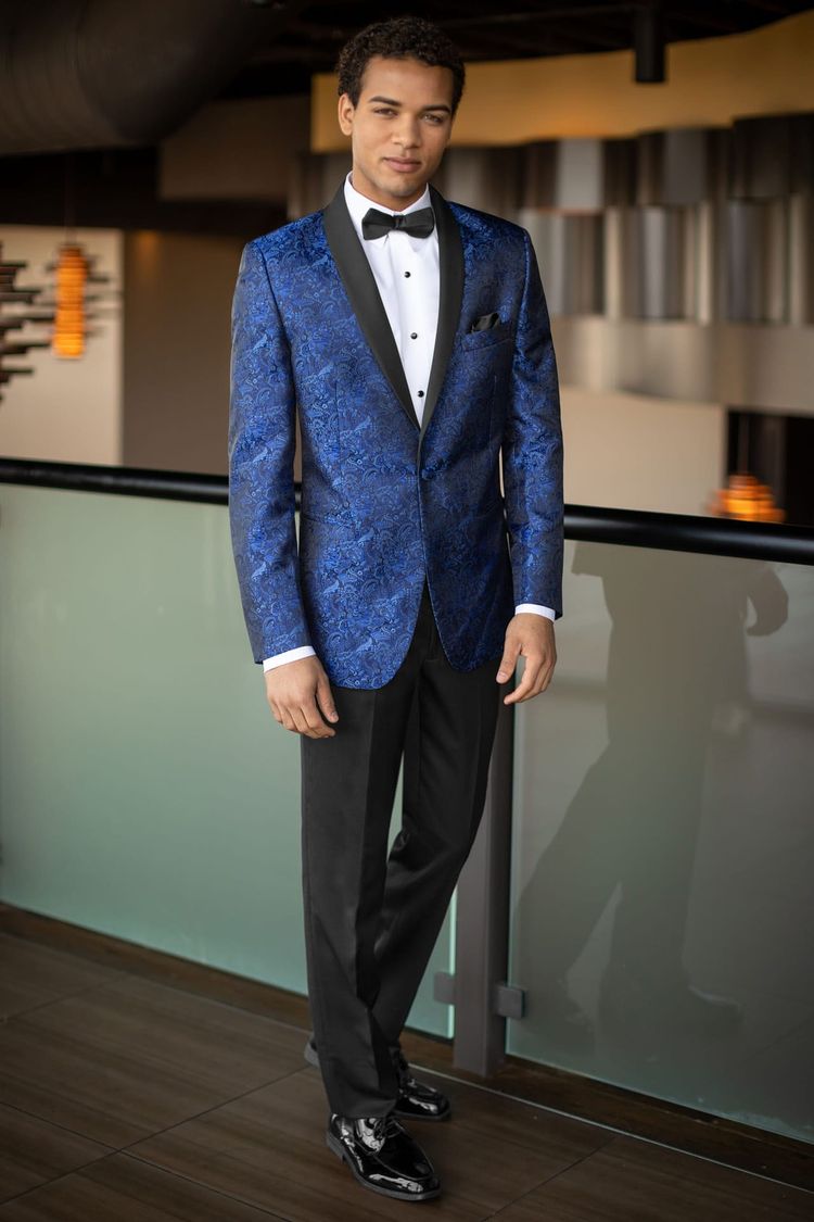 A senior at the prom in his Prom Tuxedo Cobalt Blue Paisley Mark of Distinction Aries