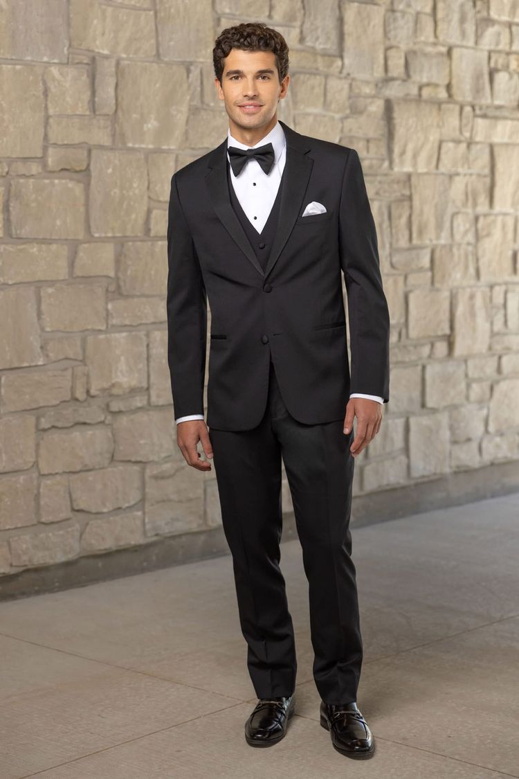man wearing Michael Kors Force Black Performance Stretch Tuxedo and tear drop bow tie